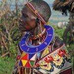 woman in white red and blue floral dress
