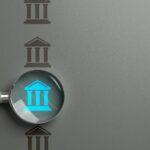 Bank research. Magnifying glass and a bank. Interest rates, investment opportunities