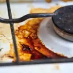 Dirty stove with food leftovers