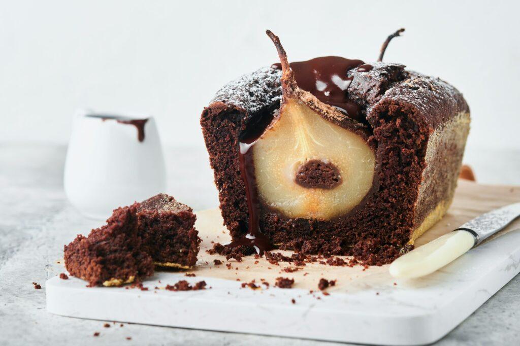 Chocolate cake with pears baked inside. Chocolate pear cake or dark chocolate bundt cake with pear o