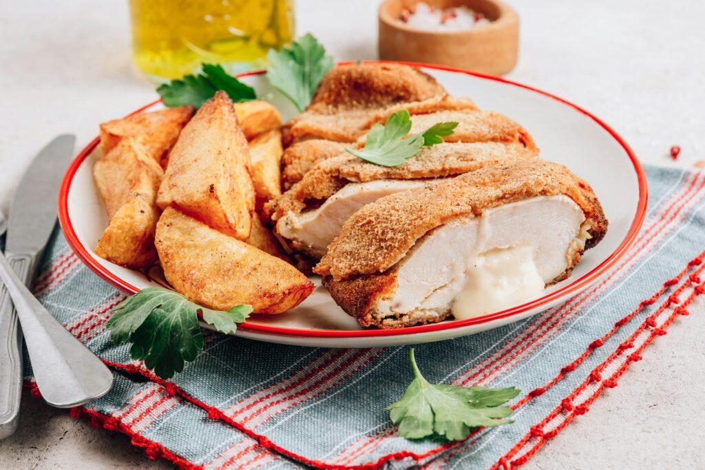 Homemade breaded chicken stuffed with cheese