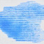Blue blot on a white sheet of paper