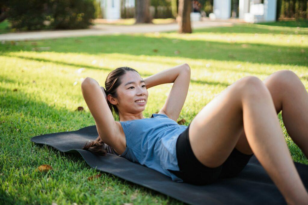 Fitness girl doing abdominal crunches
