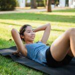 Fitness girl doing abdominal crunches