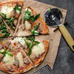 homemade pizza with tuna, mozzarella cheese, parmesan and rucola