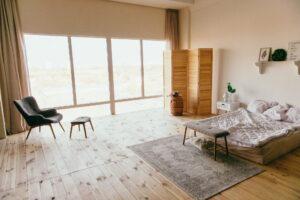 Scandinavian bedroom with french windows