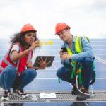 Specialist technician professional engineer checking top view of installing factory solar roof panel