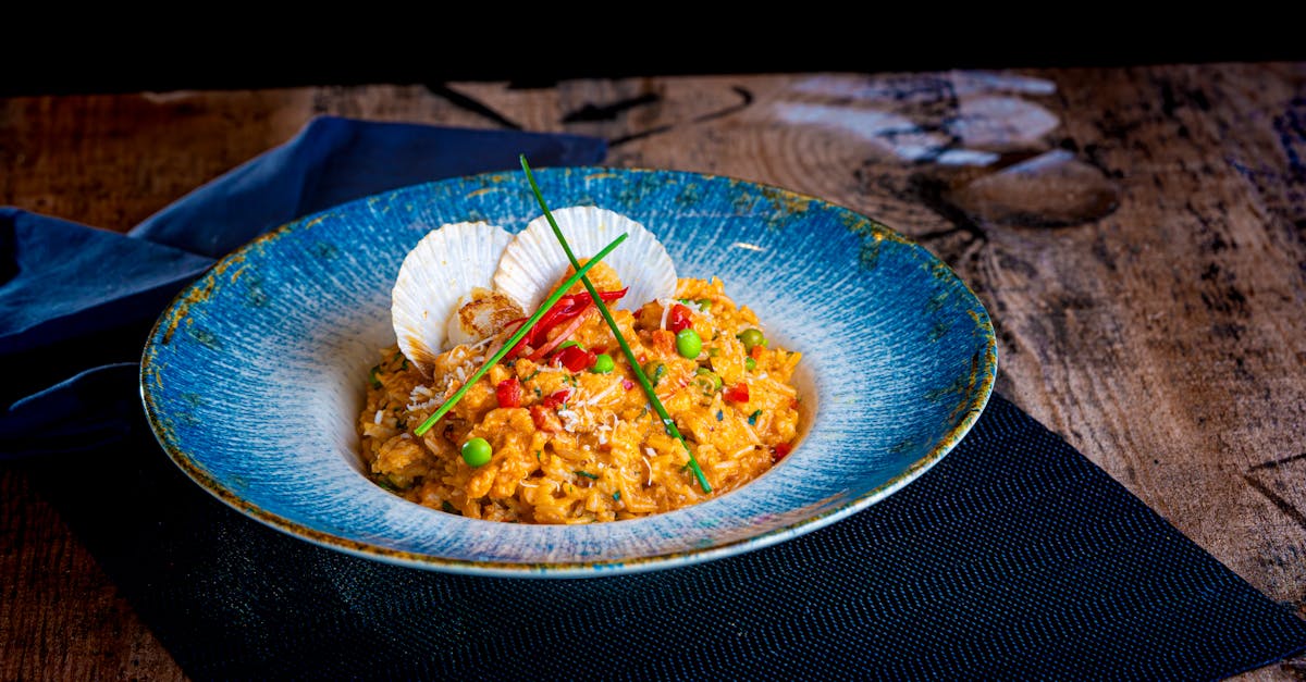 découvrez notre recette de risotto crémeux, un plat italien classique qui allie riz arborio, bouillon savoureux et parmesan. parfait pour impressionner vos invités ou savoureux en famille, ce risotto ravira vos papilles avec ses arômes délicats et sa texture onctueuse.