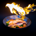Saumon grillé vibrant servi sur du riz frit aux légumes, sur un fond noir saisissant.